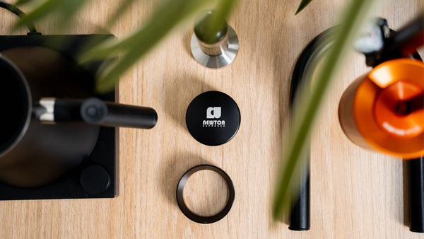 Looking down at coffee tools and accessories from above.