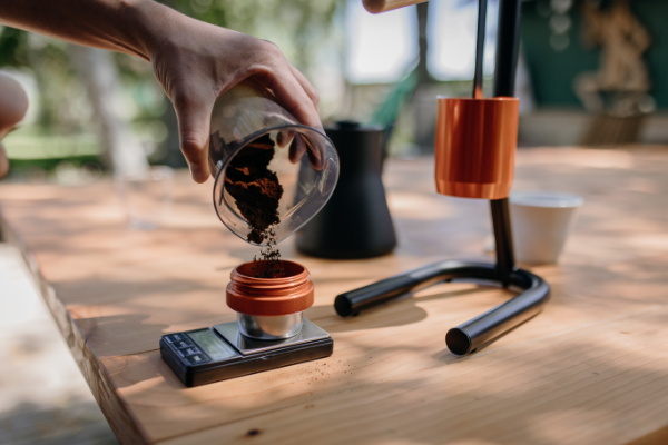 Adding coffee grinds to newton BRUA coffee basket