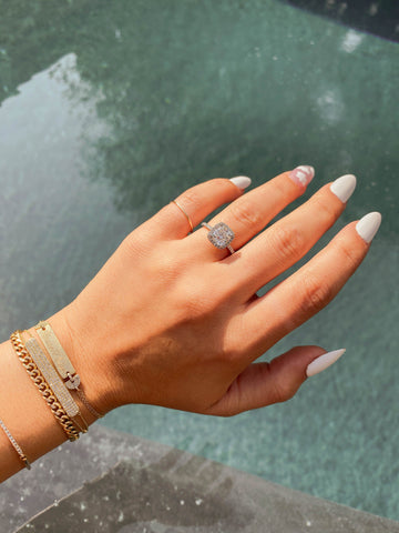 left hand, diamond ring, diamond halo engagement ring