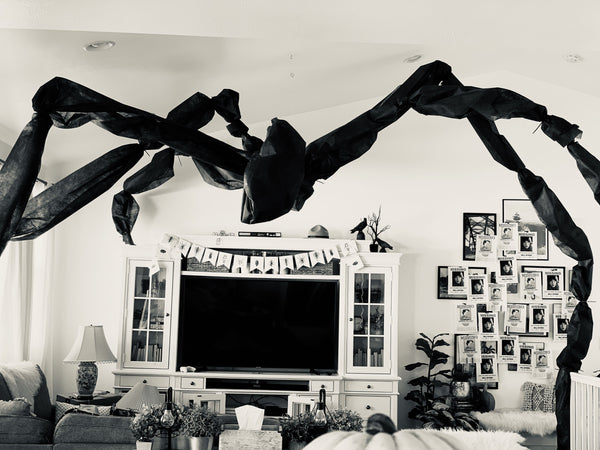 DIY giant scary creature in living room as Halloween decor