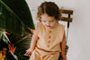 The Finley Romper in Sand