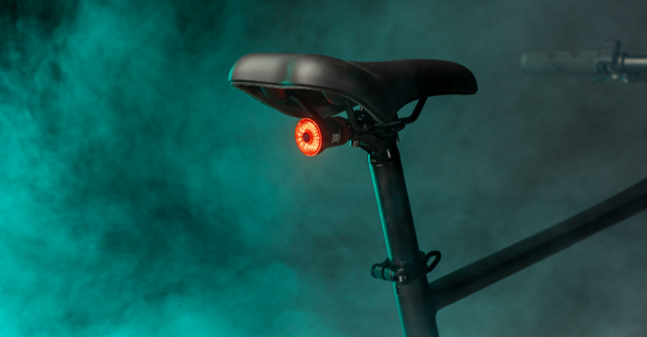 Fiido X e-bike lights up tail lights during nighttime driving.