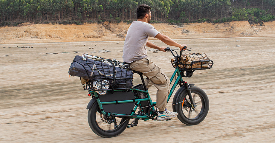 Man riding fiido t2 electric bike in the sand