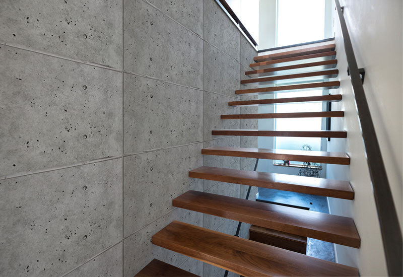 faux concrete panels in the hallway