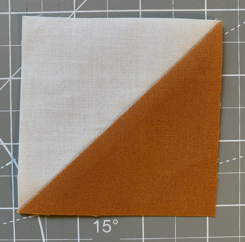 Finished and trimmed half-square triangle. 