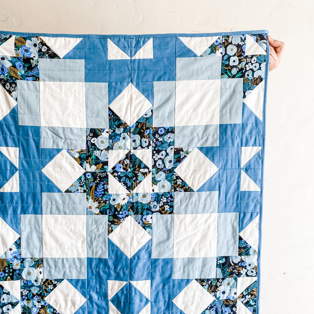 petal points baby quilt in kona cotton blue and rifle paper co garden party fabric