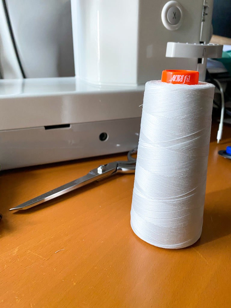 aurifil 50 wt cone in white - my go-to thread for everything
