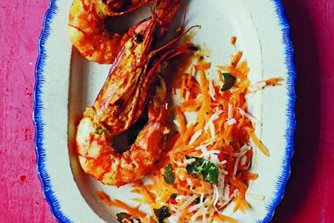 Grilled saffron prawns with carrot and coconut salad