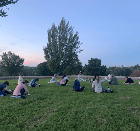 People doing yoga and pottery at Larz Anderson Park