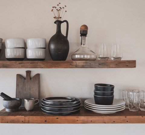 Floating reclaimed shelves with ceramic dinnerware
