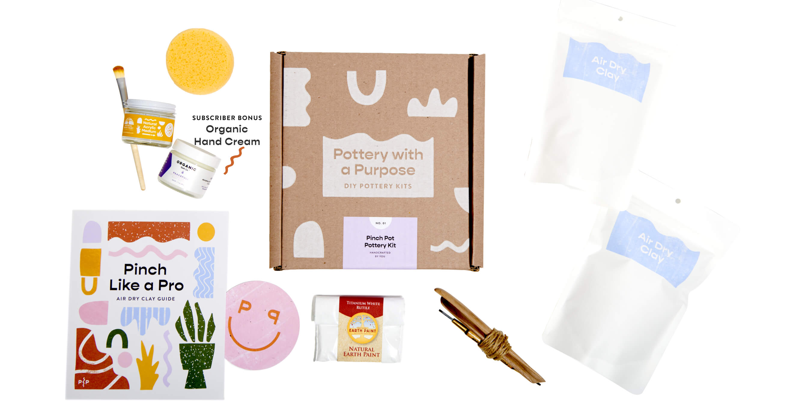Included with your make at home air dry clay kit is sculting tools, a sponge, a koster, your ping guide, acrylic paint, a vegan paintbrush, powder paint and subscription members also get a bonus hand cream.