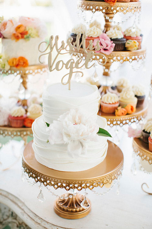 pretty white wedding cake dessert table setup