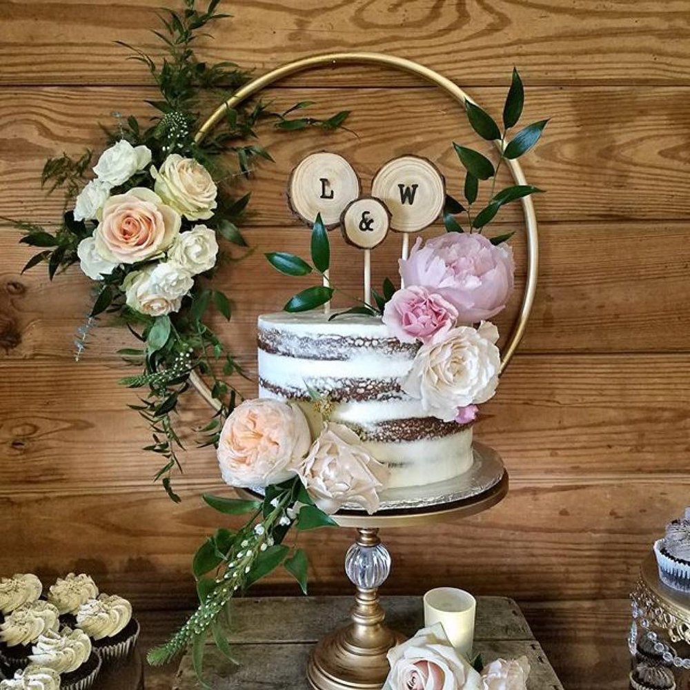 boho wedding cake on gold wedding cake stand wedding flowers