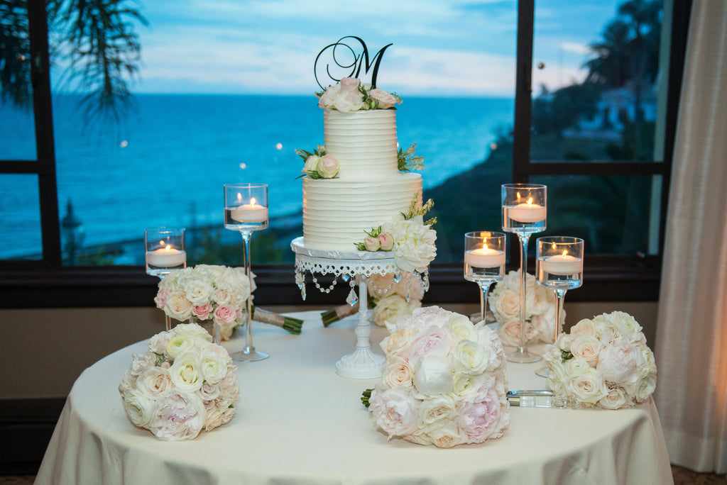 tiered wedding cake on white cake stand