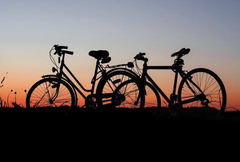 Locked bicycles in the sunset