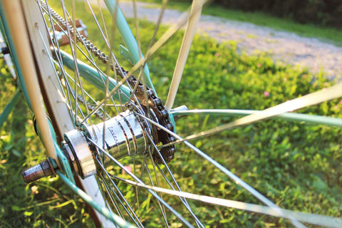 changing bicycle chain - bike wheel