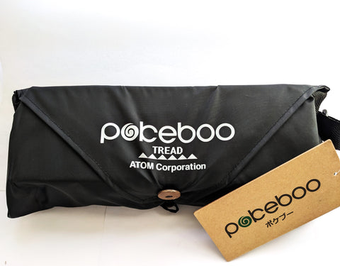 New Pokeboo Tread Packable Natural Rubber Boots folded up in their own convenient carry case