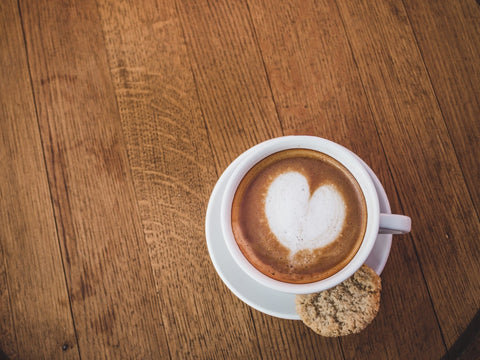 espresso coffee with heart shaped cappuccino foam