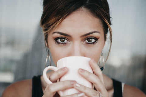 woman drinking coffee in the morning