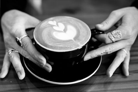 black cappuccino cup and saucer