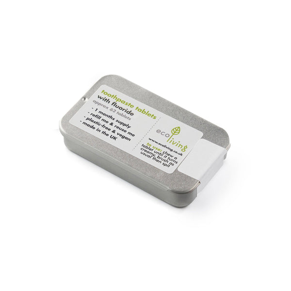 Vegan and plastic free fluoride toothpaste tablets packed in a refillable and recyclable metal tin approximately one months supply
