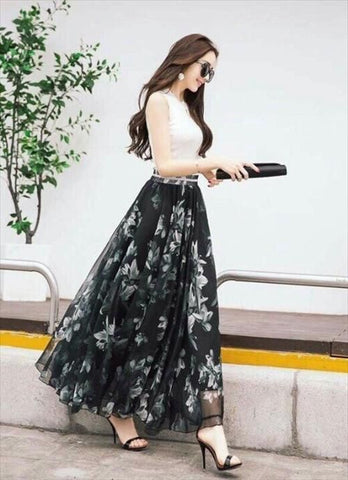 Long floral skirt with a sleeveless top