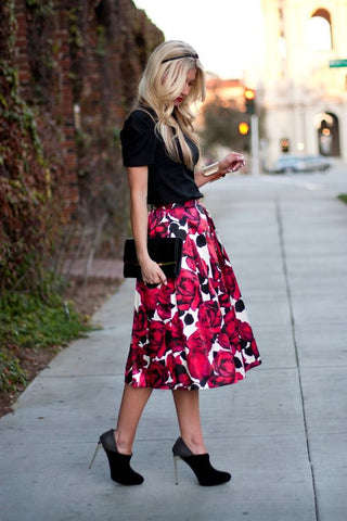 Simple blouse and knee high floral skirt