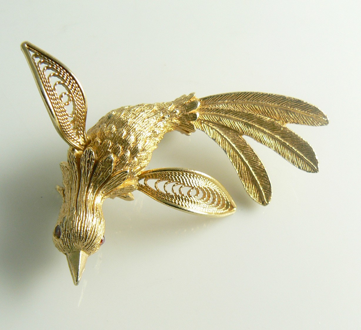 Signed J.J. detailed gold tone and mesh wing bird in flight Pin
