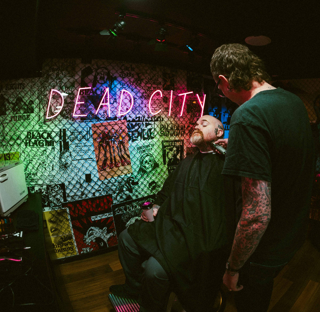 barbershop in Brisbane called dead city next to skate shop dropouts
