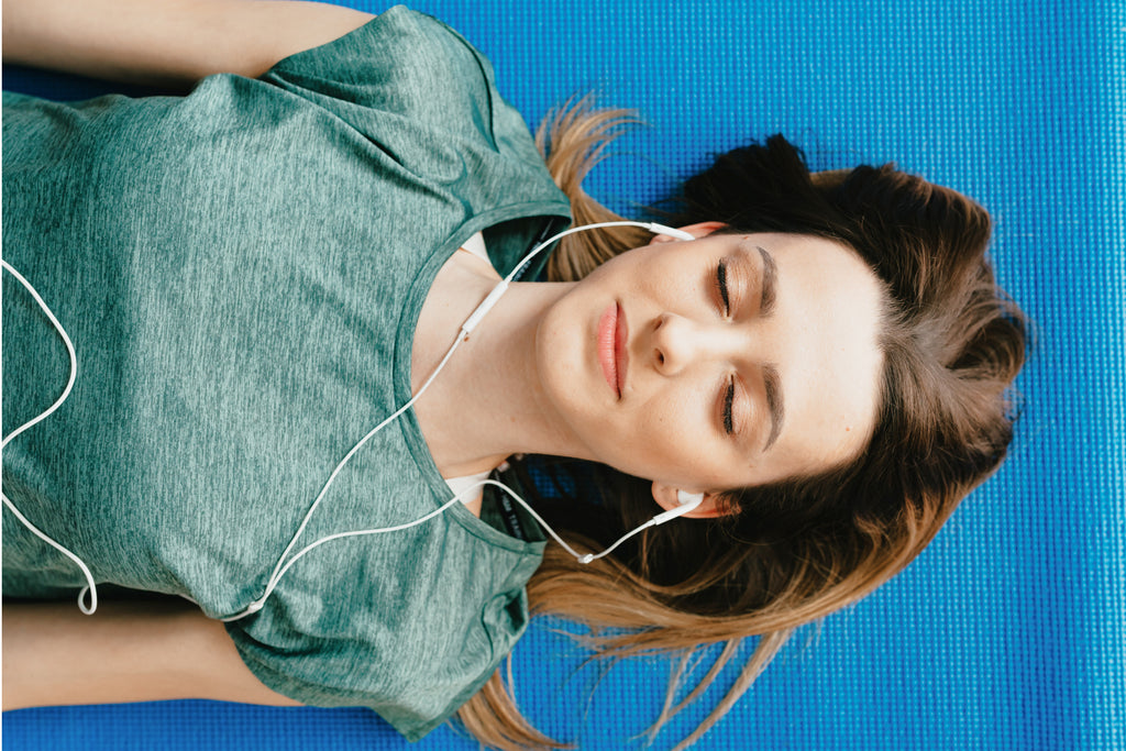 woman after yoga relaxing