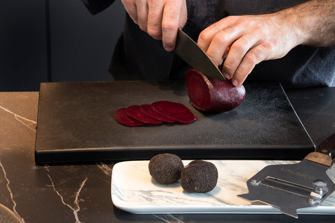 Beetroot carpaccio with crème fraîche, apple, anchovy and black truffle