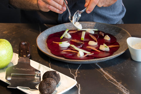 Beetroot carpaccio with crème fraîche, apple, anchovy and black truffle