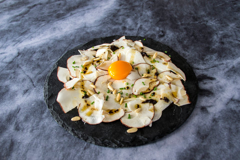 Carpaccio of boletus with white truffle vinaigrette