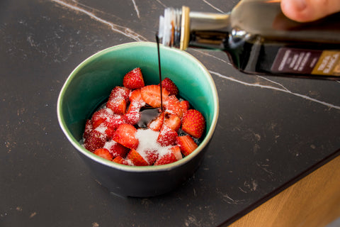 Strawberries with truffled vinegar and whipped cream