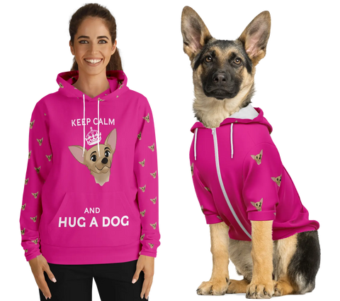 Woman and German Shepherd puppy wearing matching dog and owner hoodies in Barbiecore pink