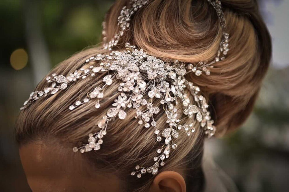 closeup of christie lauren headpiece on elegant updo