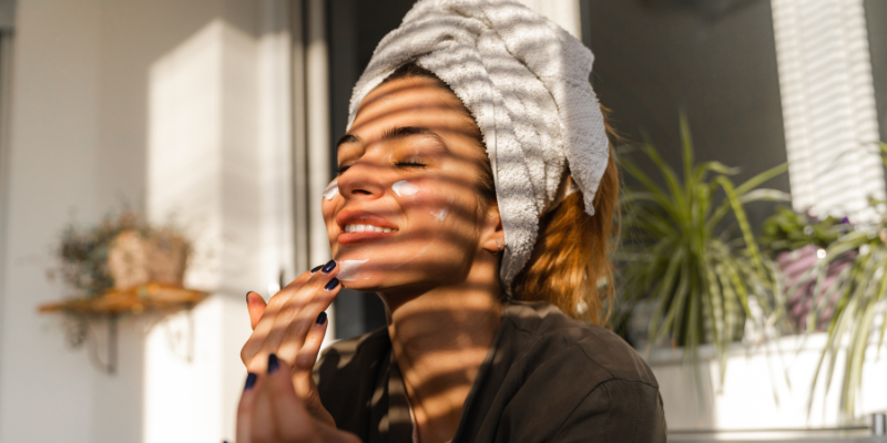 Woman using natural products to wash her face