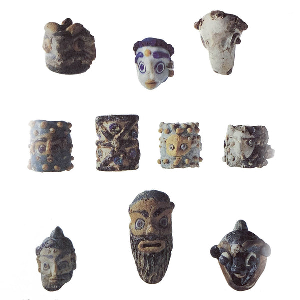 third century phoenician rod-formed heads pendants