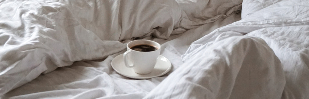 coffee-sitting-on-bed