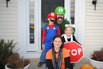 Employee Bryan A.'s family dressed up as Mario, Luigi and a stop sign