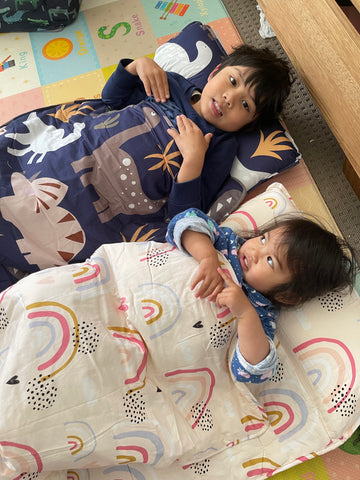 Kids using toddler nap mat for sleepovers