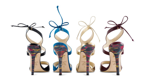 four esmeralda 105 sandals in a row gold blue burgundy and black 