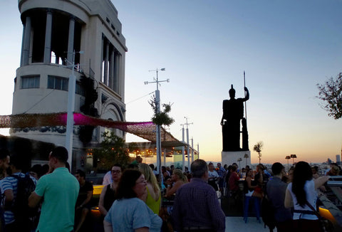 young people gathered on a rooftop in Spain