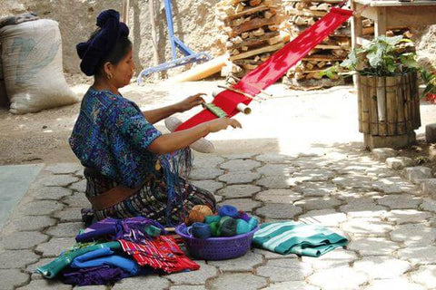 Maya woman weaving fabric