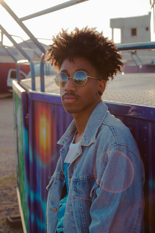 black man with afro fade and sunglasses