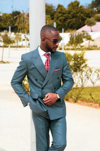 black man with short fade in suit