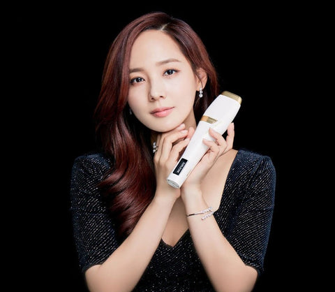 Actress Eugene holding the Dualsonic Professional HIFU beauty device - Dualsonic Professional Review - BeautyFoo Mall