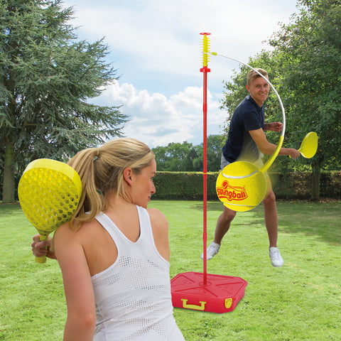 two people playing with a swing ball