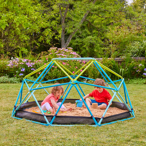 Children playing in metal climbing frame dome