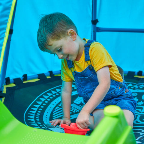 child playing in metal climbing frame waterproof den